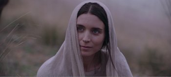 Movie still from “Mary Magdalene” (2018), directed by Garth Davis – A woman with a veil covering her face; Close Up shot, Over the shoulder angle