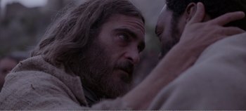 Movie still from “Mary Magdalene” (2018), directed by Garth Davis – A man with long hair and a beard looking at another man with long hair; Close Up shot, Over the shoulder angle