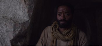 Movie still from “Mary Magdalene” (2018), directed by Garth Davis – A man with a beard wearing a scarf and jacket; Close Up shot, Low angle