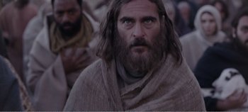 Movie still from “Mary Magdalene” (2018), directed by Garth Davis – A person with a beard wearing a robe; Close Up shot, Low angle