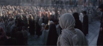 Movie still from “Mary Magdalene” (2018), directed by Garth Davis – A group of people gathered in a large crowd; Wide shot, High angle