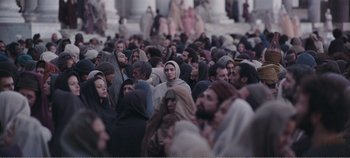 Movie still from “Mary Magdalene” (2018), directed by Garth Davis – A group of people standing around each other; Extreme Wide shot, High angle