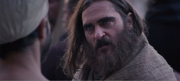 Movie still from “Mary Magdalene” (2018), directed by Garth Davis – A person with long hair and a beard; Close Up shot, Low angle