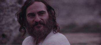 Movie still from “Mary Magdalene” (2018), directed by Garth Davis – A man with long hair and a long beard; Close Up shot, Over the shoulder angle