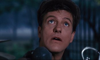 Movie still from “Mary Poppins” (1964), directed by Robert Stevenson – A person with a microphone; Close Up shot, Low angle
