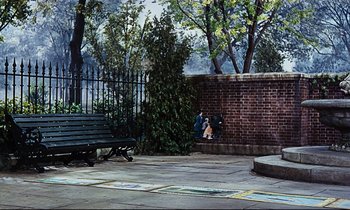 Movie still from “Mary Poppins” (1964), directed by Robert Stevenson – Two people sitting on a bench near a fence; Wide shot, High angle