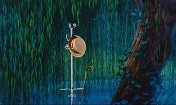 Movie still from “Mary Poppins” (1964), directed by Robert Stevenson – A hat hanging on a pole in front of a painting; Close Up shot, Low angle