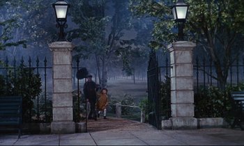 Movie still from “Mary Poppins” (1964), directed by Robert Stevenson – A couple of people that are in a park; Wide shot, High angle