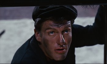 Movie still from “Mary Poppins” (1964), directed by Robert Stevenson – A person wearing a hat and looking at the camera; Close Up shot, Overhead angle