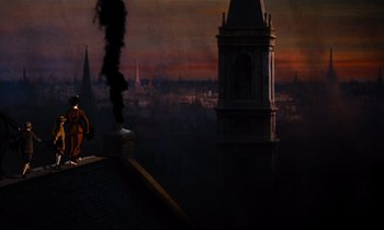 Movie still from “Mary Poppins” (1964), directed by Robert Stevenson – A view of a city from the top of a building; Extreme Wide shot, Low angle