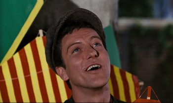 Movie still from “Mary Poppins” (1964), directed by Robert Stevenson – A person wearing a hat; Close Up shot, Low angle