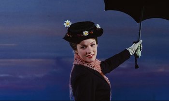 Movie still from “Mary Poppins” (1964), directed by Robert Stevenson – A woman holding an open umbrella with daisies on top of her head; Medium shot, Low angle