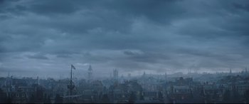 Movie still from “Mary Poppins Returns” (2018), directed by Rob Marshall – A view of a large city in the middle of the night; Extreme Wide shot, Low angle