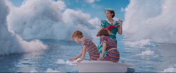 Movie still from “Mary Poppins Returns” (2018), directed by Rob Marshall – A woman and two children on a boat in the water; Wide shot, High angle