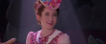 Movie still from “Mary Poppins Returns” (2018), directed by Rob Marshall – A person wearing a hat; Close Up shot, Over the shoulder angle