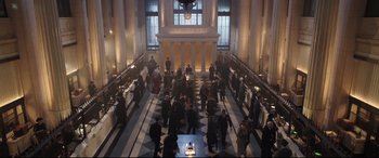 Movie still from “Mary Poppins Returns” (2018), directed by Rob Marshall – A large group of people in a large room; Extreme Wide shot, High angle