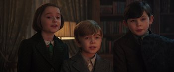 Movie still from “Mary Poppins Returns” (2018), directed by Rob Marshall – A group of young people standing next to each other; Close Up shot, Low angle