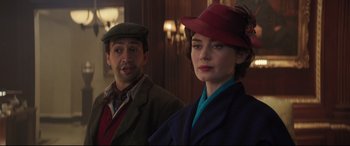 Movie still from “Mary Poppins Returns” (2018), directed by Rob Marshall – A man and a woman standing next to each other; Close Up shot, Over the shoulder angle