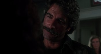 Movie still from “Mask” (1985), directed by Peter Bogdanovich – A person with a mustache; Close Up shot, Over the shoulder angle