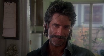 Movie still from “Mask” (1985), directed by Peter Bogdanovich – A person with a beard; Close Up shot, Low angle