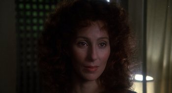 Movie still from “Mask” (1985), directed by Peter Bogdanovich – A person with curly hair; Close Up shot, Low angle