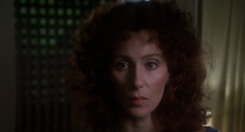 Movie still from “Mask” (1985), directed by Peter Bogdanovich – A person with curly red hair; Close Up shot, Low angle