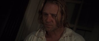 Movie still from “Master and Commander: The Far Side of the World” (2003), directed by Peter Weir – A person with long hair; Close Up shot, Over the shoulder angle