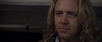 Movie still from “Master and Commander: The Far Side of the World” (2003), directed by Peter Weir – A person with long blonde hair; Close Up shot, Over the shoulder angle