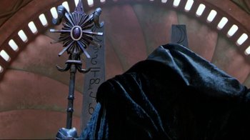 Movie still from “Masters of the Universe” (1987), directed by Gary Goddard – A crucifixion scene with a cross; Medium shot, Low angle