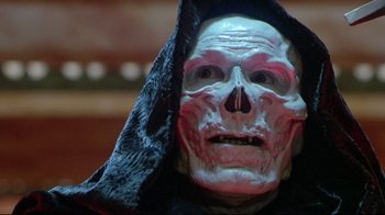 Movie still from “Masters of the Universe” (1987), directed by Gary Goddard – The face of an evil looking skeleton; Close Up shot, Low angle