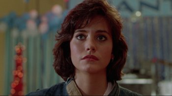 Movie still from “Masters of the Universe” (1987), directed by Gary Goddard – A person wearing a jacket; Close Up shot, Over the shoulder angle