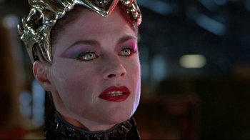 Movie still from “Masters of the Universe” (1987), directed by Gary Goddard – A person wearing a costume; Close Up shot, Over the shoulder angle