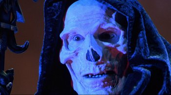 Movie still from “Masters of the Universe” (1987), directed by Gary Goddard – The face of a skeleton mask; Close Up shot, Low angle