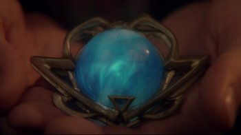 Movie still from “Masters of the Universe” (1987), directed by Gary Goddard – A person holding a blue ball; Extreme Close Up shot, Overhead angle