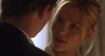 Movie still from “Match Point” (2005), directed by Woody Allen – A man and a woman looking into each others eyes; Close Up shot, Over the shoulder angle