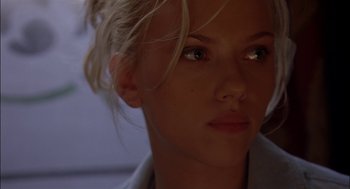 Movie still from “Match Point” (2005), directed by Woody Allen – A woman's face in the dark; Close Up shot, Low angle