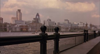 Movie still from “Match Point” (2005), directed by Woody Allen – A view of a city from a bridge; Extreme Wide shot, Low angle