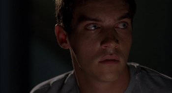 Movie still from “Match Point” (2005), directed by Woody Allen – A person looking at the camera; Close Up shot, Over the shoulder angle