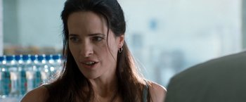 Movie still from “Matchstick Men” (2003), directed by Ridley Scott – A person with long dark hair; Close Up shot, Over the shoulder angle