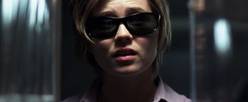 Movie still from “Matchstick Men” (2003), directed by Ridley Scott – A person wearing sunglasses; Close Up shot, Low angle