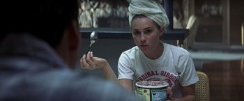 Movie still from “Matchstick Men” (2003), directed by Ridley Scott – A woman holding a spoon in front of a bowl of cereal; Close Up shot, Over the shoulder angle