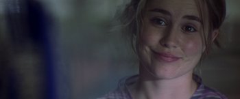 Movie still from “Matchstick Men” (2003), directed by Ridley Scott – A woman's face in a blurry photo; Close Up shot, Over the shoulder angle