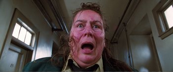 Movie still from “Matilda” (1996), directed by Danny DeVito – A person's face with pink makeup; Close Up shot, Low angle