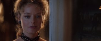 Movie still from “Maverick” (1994), directed by Richard Donner – A person looking out of a window; Close Up shot, Over the shoulder angle