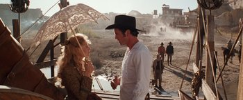 Movie still from “Maverick” (1994), directed by Richard Donner – A man and a woman are talking to each other; Medium shot, Over the shoulder angle