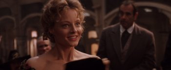 Movie still from “Maverick” (1994), directed by Richard Donner – A person wearing a suit and tie; Close Up shot, Over the shoulder angle