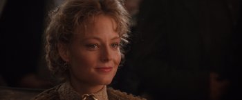 Movie still from “Maverick” (1994), directed by Richard Donner – A person wearing a jacket; Close Up shot, Over the shoulder angle