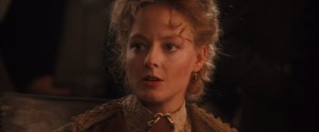 Movie still from “Maverick” (1994), directed by Richard Donner – A person wearing a jacket; Close Up shot, Over the shoulder angle