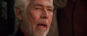 Movie still from “Maverick” (1994), directed by Richard Donner – An older man with a beard and a mustache; Extreme Close Up shot, Low angle