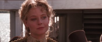 Movie still from “Maverick” (1994), directed by Richard Donner – A person wearing a dress; Close Up shot, Over the shoulder angle